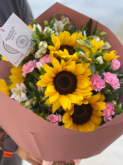 Girasoles y astromelias